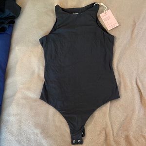 NWT Quince medium black bodysuit nylon/spandex Ptp 15-17in. Very stretchy thong